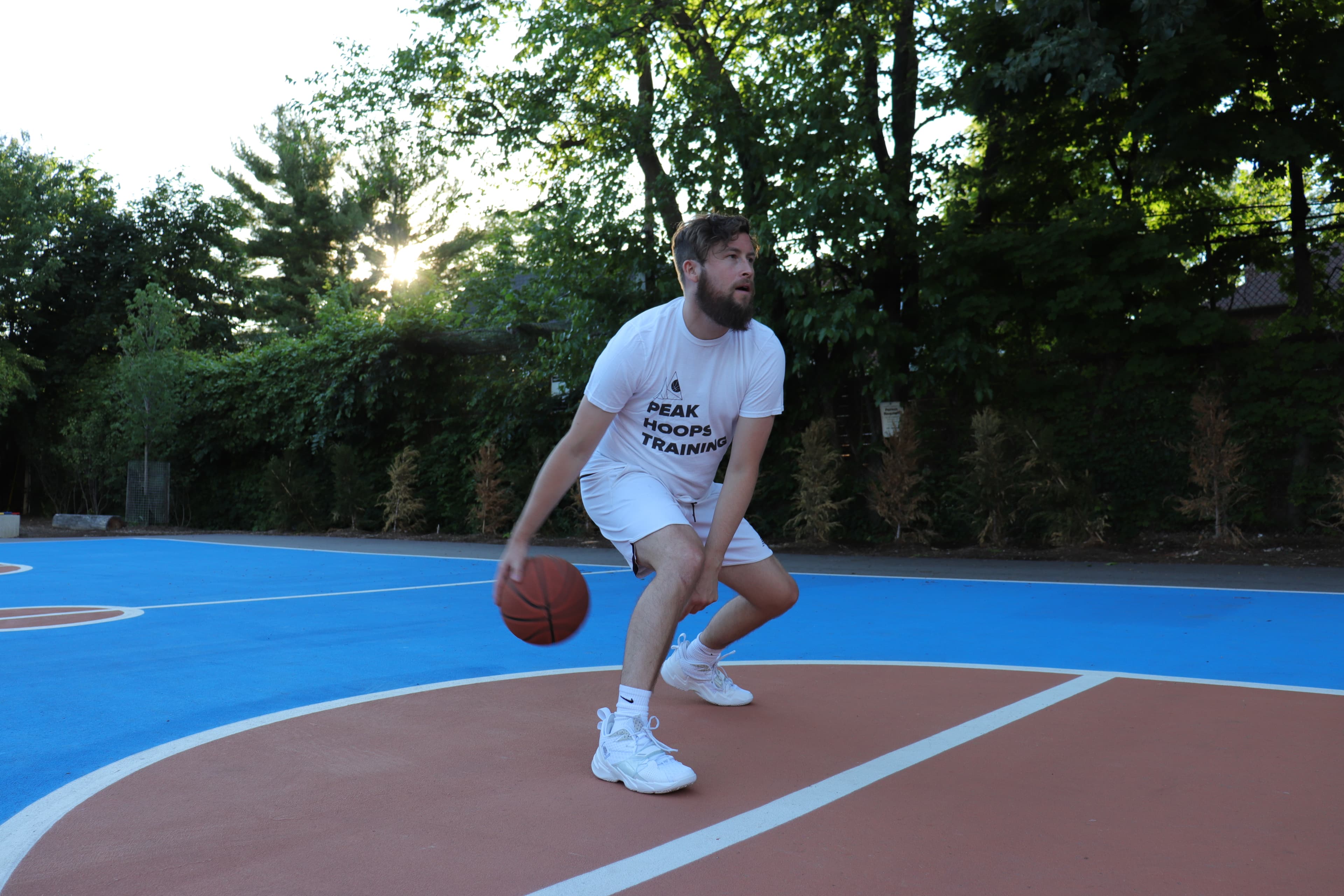 Coach Nolan demonstrating a dribbling drill